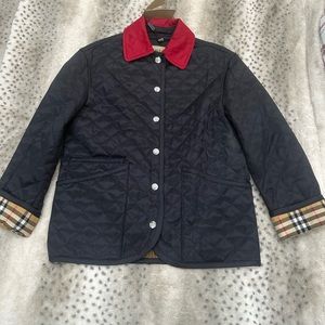 Women’s XS Burberry Navy Blue Quilted Jacket. It is NWT.